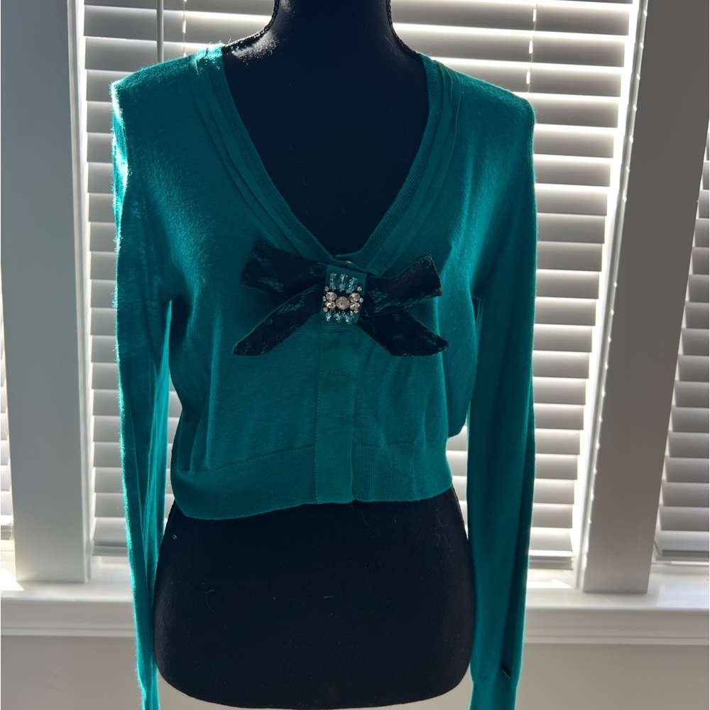 Short beautiful teal sweater…